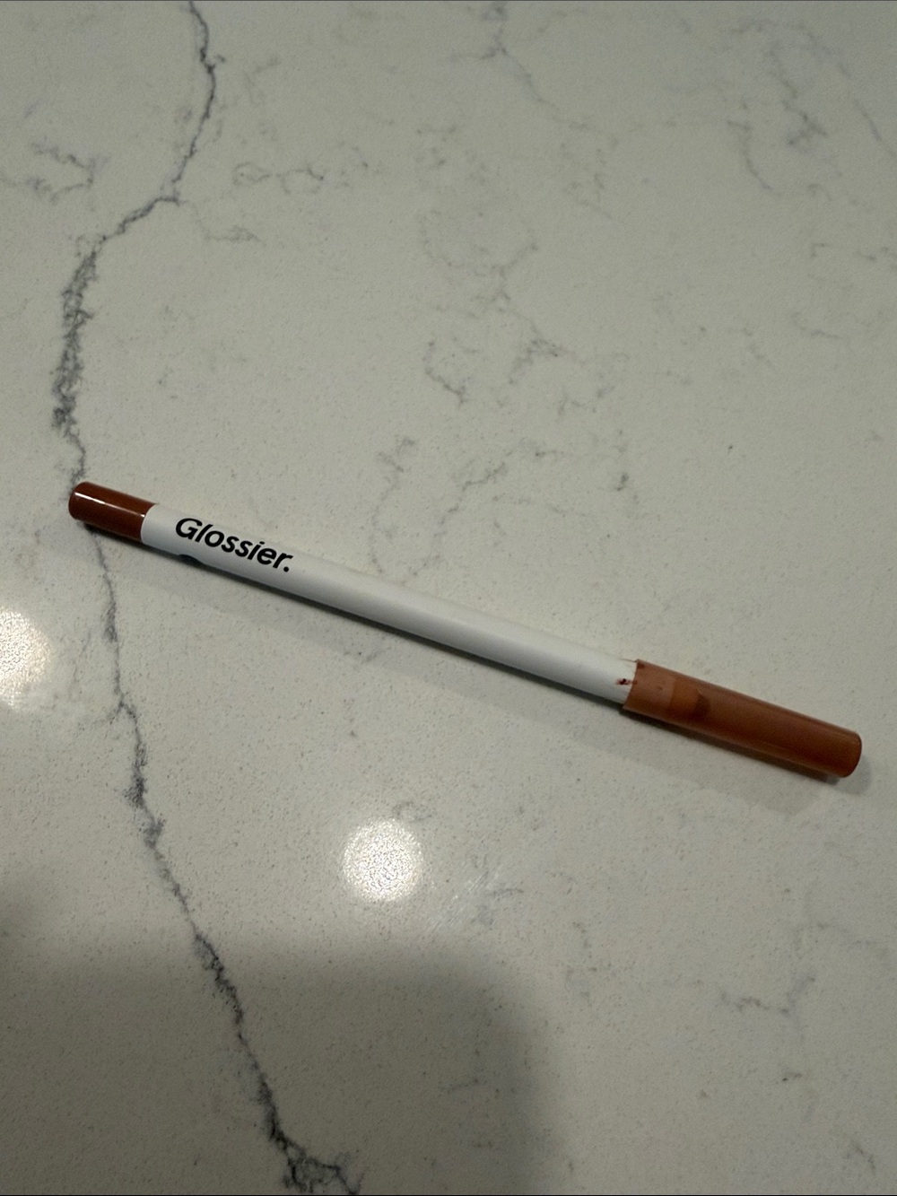 Glossier lip liner pencil in Buff